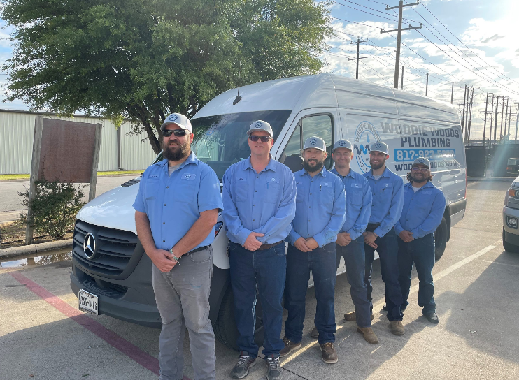 Woodie Woods Van with plumbing team